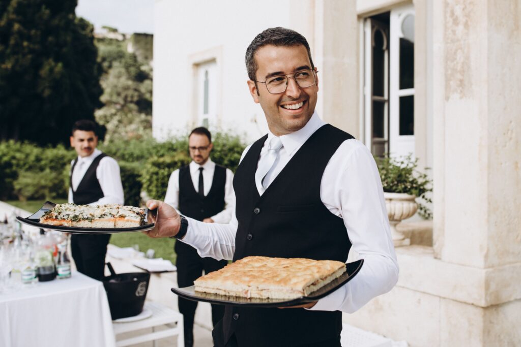 Man serving food at wedding